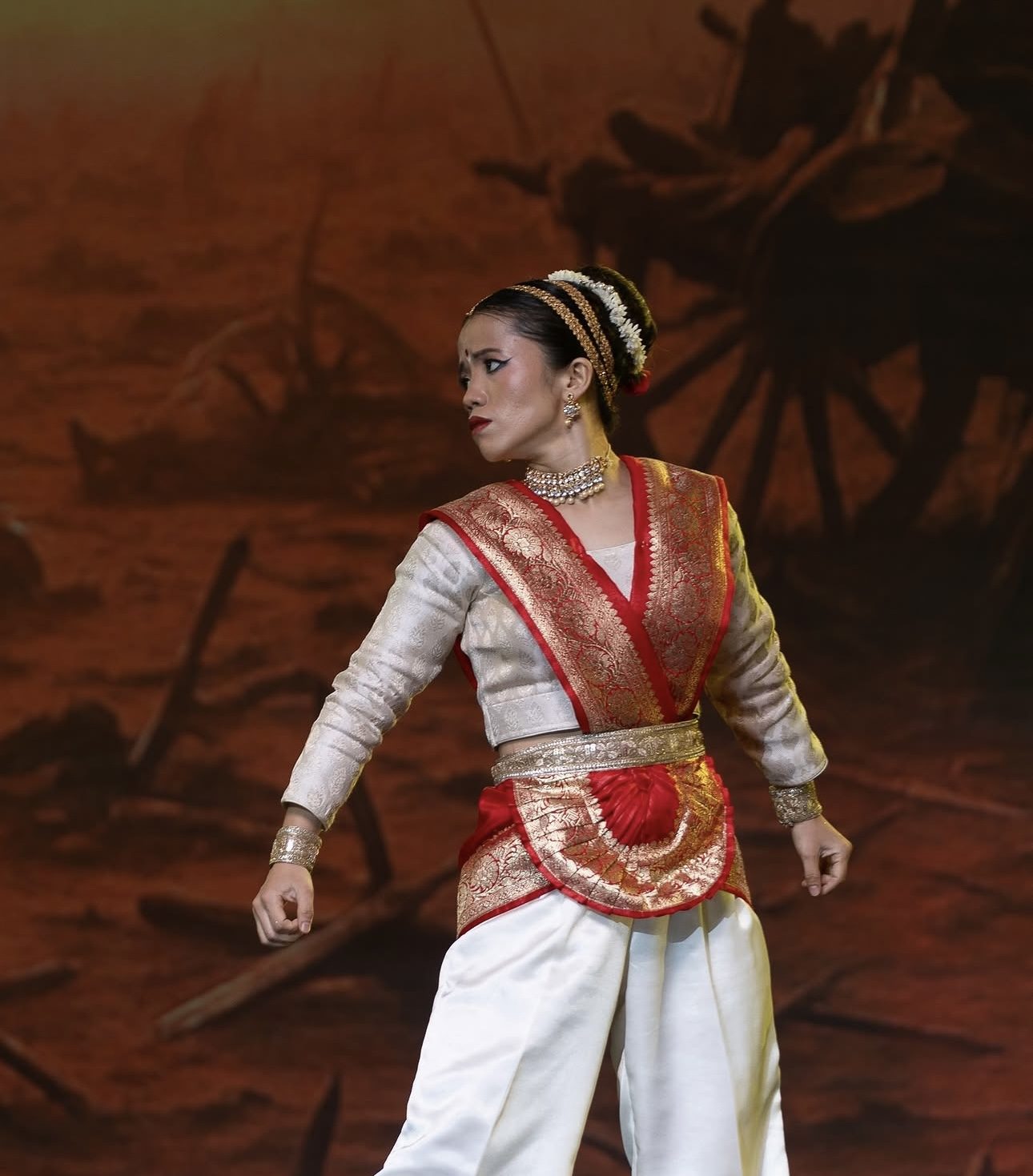 Amrita Rai in a narrative folk performance with dramatic stage styling