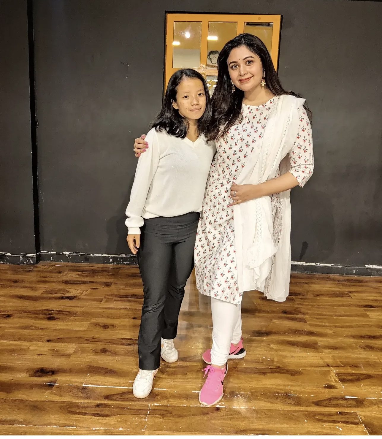 Amrita Rai with a Bollywood actress she has trained